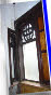 Highly ornate door and windows, possibly from another room/building? 